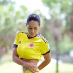 EXCLUSIVE: MMA reporter Andrea Calle shows support for her native Colombia in the World Cup as she wears their colors for some soccer training at a park in South Beach